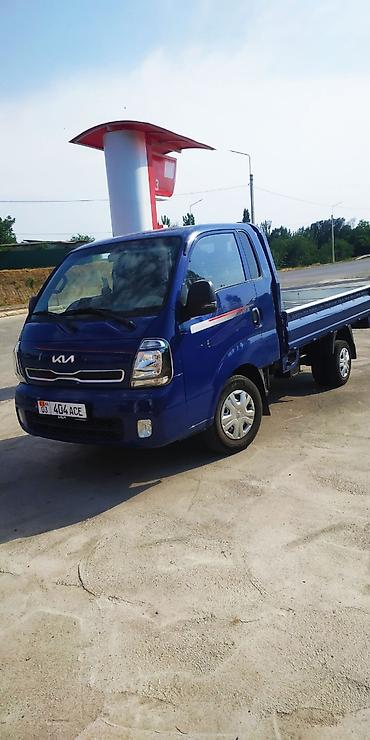 грузавой фура: Kia Bongo (K-series) с бортовой платформой — компактный городской — 2