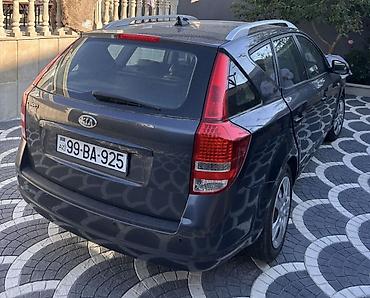 kia optima nece masindi: Kia Cee’d SW (universal), tünd boz rəng. - Gövdə tipi: universal (SW) — 7