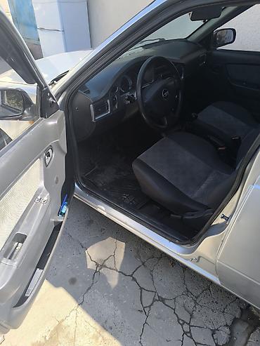 Унаа: Chevrolet Nexia: 2011 г., 1.6 л, Кол менен иштөөчү, Бензин, Седан — 7