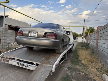 Услуги эвакуатора: С прямой платформой — 10