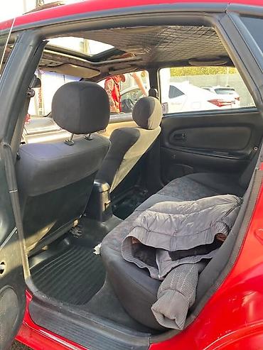 бампер byd e2: Mazda 323: 1997 г., 1.6 л, Механика, Бензин, Хэтчбэк — 2