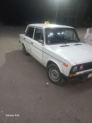 opel astra k: Ağ rəngli VAZ 2106 sedan – klassik model. Şəhər içi sərnişin — 4