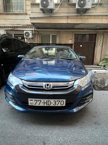 qoşqu yeri: Honda Insight: 1.3 l | 2013 il Sedan