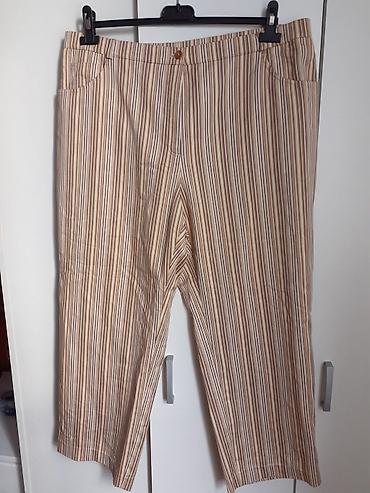 Pruge pantalone sa širokim krojem - Model: dugačke pantalone ravnih