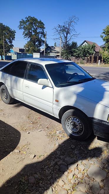митсубиси спайк стар: Mazda 626: 1989 г., Механика, Седан — 6