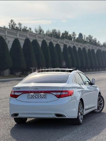 megane disk: Hyundai Grandeur (Azera) – ağ rəng, sedan, geniş və komfortlu salon — 7