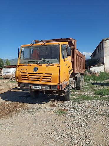 с кму: Самосвал CAMC (кабина с надписью STEYR), 6x4. Особенности: - Колесная — 1