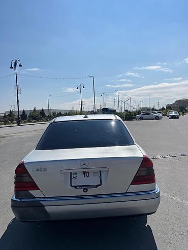 mersedes peci: Mercedes-Benz C 200: 2 l | 1995 il Sedan — 5