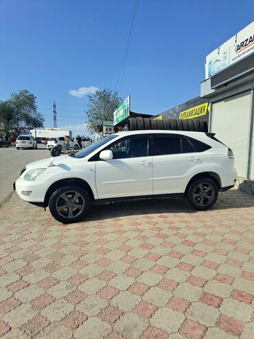 салон ауди: Продается автомобиль Lexus Harrier белого цвета. Этот кроссовер