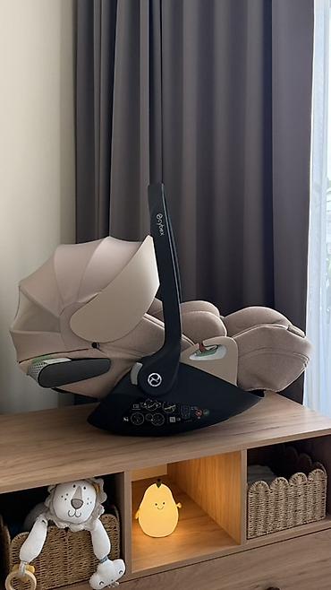 hipseat: Детское автокресло-переноска Cybex (группа 0+) в бежевом цвете — 3