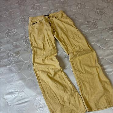 yeni model koftalar: Açıq sarı rəngli kişi şalvarı - Model: 5 ciblə klassik denim kəsimi — 1