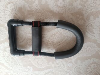 Şüşələr: Məhsul: bilek ucun idman aleti Təsvir: - Portativ, qapalı “D” formalı