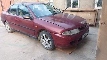 Транспорт: Mitsubishi Carisma: 1989 г., Автомат, Бензин, Седан — 1