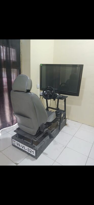 x plata: Avtomobil sürmə simulyatoru komplekti X box oyun konsulu 1000azn