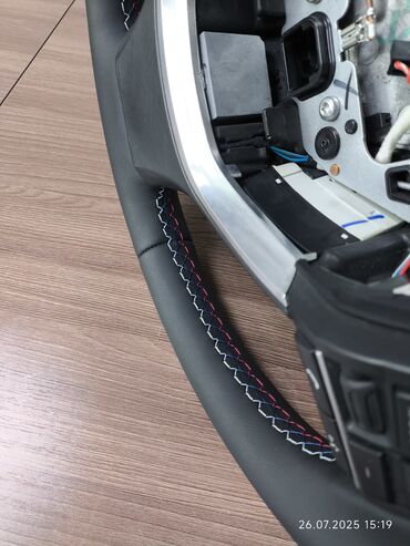 Работы по обшивке: Перетяжка рулей натуральной кожей и ЭКО кожа - Профессиональная — 9