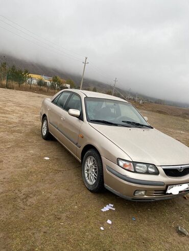 калпак на мазду: Mazda 626: 1997 г., 2 л, Механика, Бензин, Седан