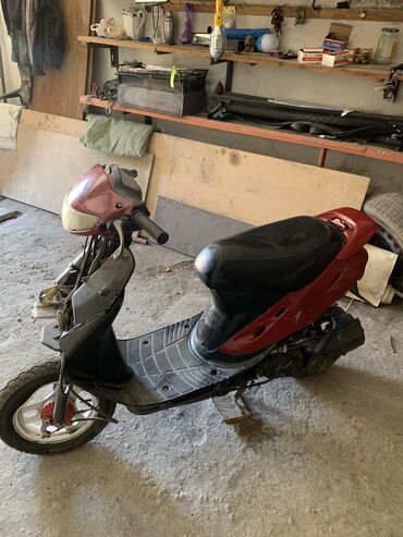 мотороллер скутер: Скутер Honda, Бензин