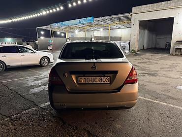 masin zapi: Nissan Tiida sedan – fərqli dizaynlı şəhər avtomobili 1,6 mator — 3