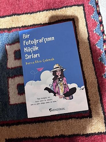 kitab şəkilləri profil ucun: Məhsul: Kitab – “Bir Fotoğrafçının Küçük Sırları” Müəllif: Burcu Ekin — 1