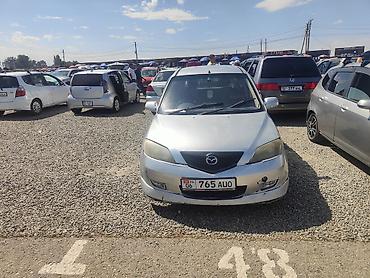 e6 3: Mazda Demio: 2003 г., 1.3 л, Автомат, Бензин, Хэтчбэк — 2