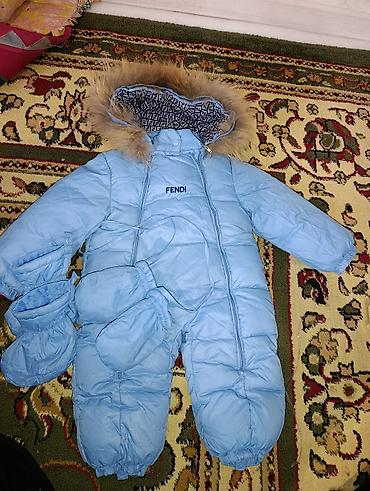 оптом одежда женская: Детский зимний комбинезон Fendi, голубой - Теплый цельный комбинезон — 1