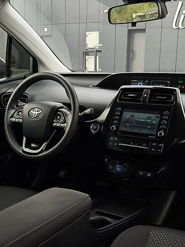 экономия бензин: Toyota Prius: 2021 г., 1.8 л, Автомат, Гибрид, Лифтбек — 8