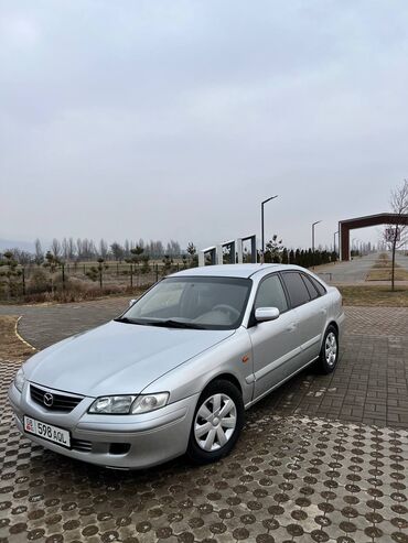 зимнее: Mazda 626: 2000 г., 2 л, Механика, Бензин, Хэтчбэк