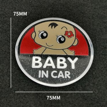 Наклейки и эмблемы: Алюминиевая наклейка на автомобиль. Ребёнок в машине