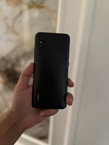 Redmi: Redmi 9A, 32 GB, rəng - Qara, Barmaq izi, Face ID — 7