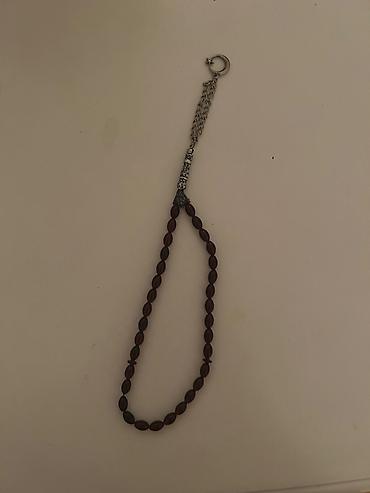 təsbəh: Təsbeh – bənövşəyi-qəhvəyi tonlarda oval dənələr, metal başlıq və — 1