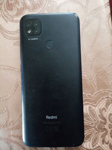 холодильник для дома: Redmi 9C, 32 ГБ, цвет - Черный, Отпечаток пальца