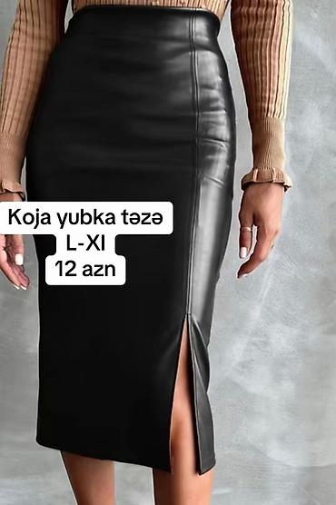koja ətək: Koja yubka – qara rəng, dizaltı uzunluqda, dar siluetli. Yan hissədə — 1