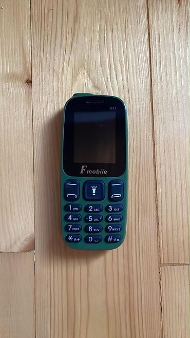 iphone en ucuz telefon: Fmobile K11 düyməli mobil telefon - Rəng: yaşıl gövdə, qara ön panel - — 1