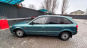 Mazda: Mazda 323: 2003 г., 1.6 л, Автомат, Бензин, Универсал — 13