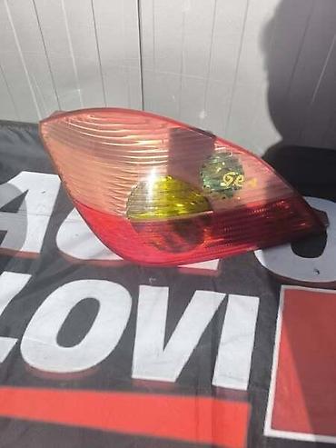 nodi auto: LEVO STOP SVETLO ZA OPEL TIGRA OD 2004. DO 2009. GOD. | Molba za — 1