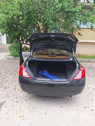 2012 07: Nissan Sunny: 1.5 l | 2012 il Sedan — 9