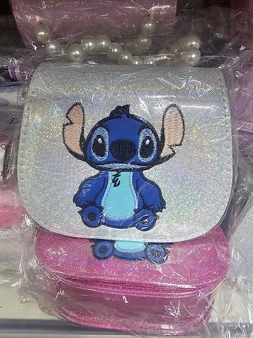 Rančevi, torbe i koferi: Torbice 1500

00din — 4