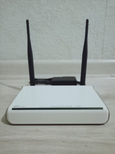 Аксессуары для ТВ и видео: Wi-Fi роутер N300 с функцией adsl-модема Tenda W300D. Бюджетное