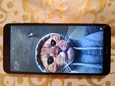 təcili iphone: Xiaomi Redmi 7A, 16 GB, rəng - Qara, 
 İki sim kartlı