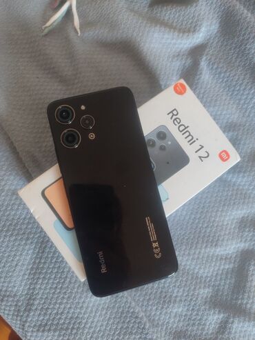 telfon islenmis: Xiaomi 12, 256 GB, rəng - Qara, 
 Barmaq izi, İki sim kartlı
