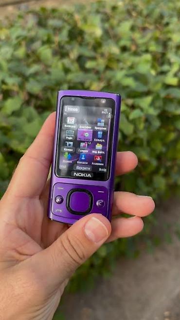 nokia c2 01: Nokia 6700 Slide, Б/у, цвет - Фиолетовый — 1