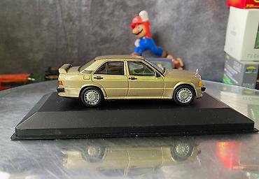 Avtomobil modelləri: Коллекционная модель Mercedes-Benz 190E 2.3 16V W201 gold 1984 EDICOLA — 9