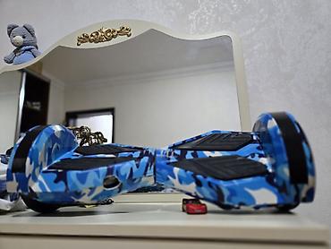 Giroskuterlər: Məhsul: Elektrik hoverboard (self‑balancing skuter) Xüsusiyyətlər: - — 2