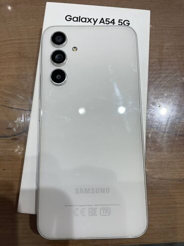 телефон fly 243: Samsung Galaxy A54 5G, 128 ГБ, цвет - Белый, Гарантия, Отпечаток пальца, Беспроводная зарядка