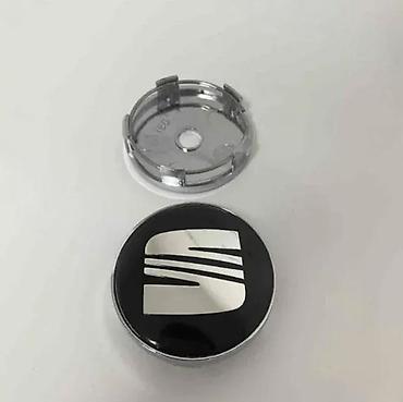 Gume i felne: ČEPOVI POKLOPCI ZA FELNE SEAT 60 MM / 56 MM - CRNI | ORIGINALNI — 1