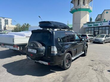 Mitsubishi: Mitsubishi Pajero IV, черный внедорожник 5-дверный Объем 3 бензин