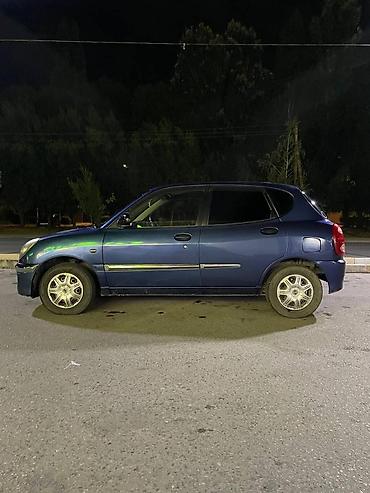 Toyota: Toyota Дуэт: 2003 г., 0.9 л, Автомат, Бензин, Хэтчбэк — 13