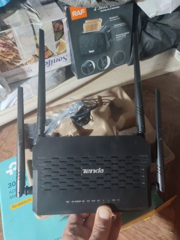 Monitorlar: Tenda 4 Antenalı Wireless N300 ADSL2+ Modem Router Xüsusiyyətlər: -