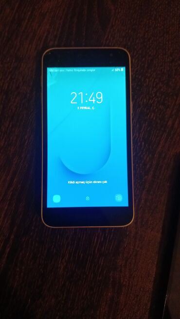 телефон fly ds131: Samsung Galaxy J2 Core, цвет - Золотой, Две SIM карты