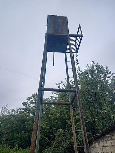ev saatlari: Metall su çəni və dayaq konstruksiyası - Material: qalın divarlı — 1